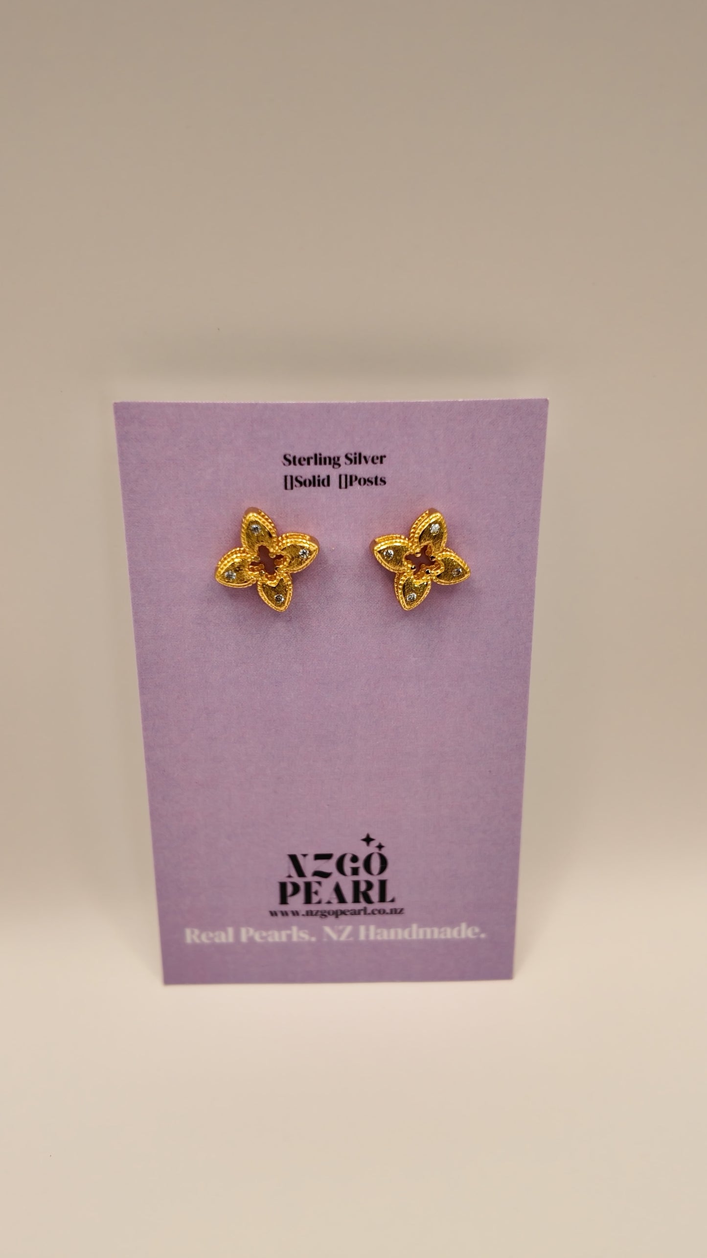 Gold Flower Stud Earrings with CZ Accents