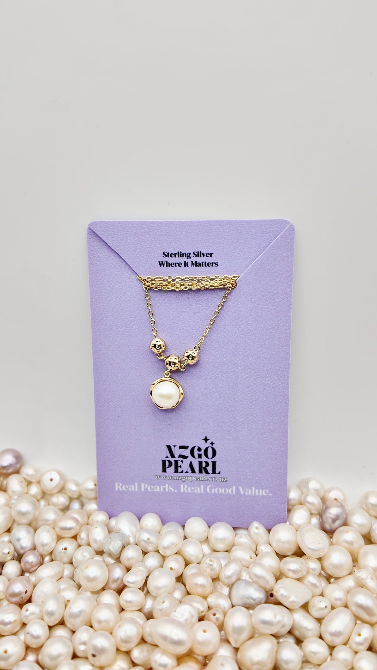 Orbit Pearl Drop Necklace