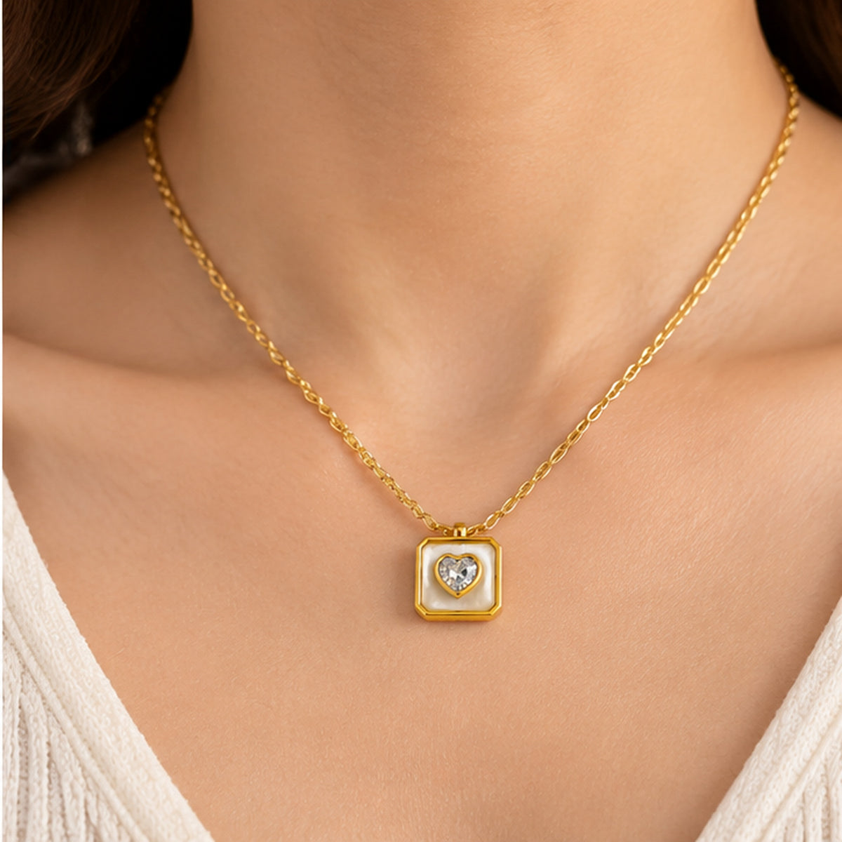 Gold heart crystal mother of pearl square pendant necklace worn on the neck