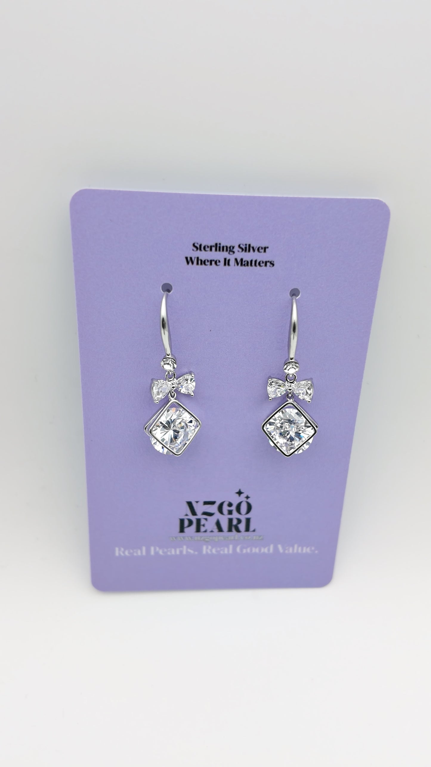 Bow-Topped Crystal Drop Earrings