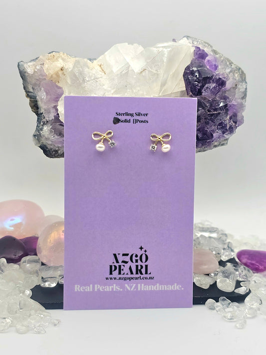 Golden Ribbon Mini Pearl Studs – Delicate Charm