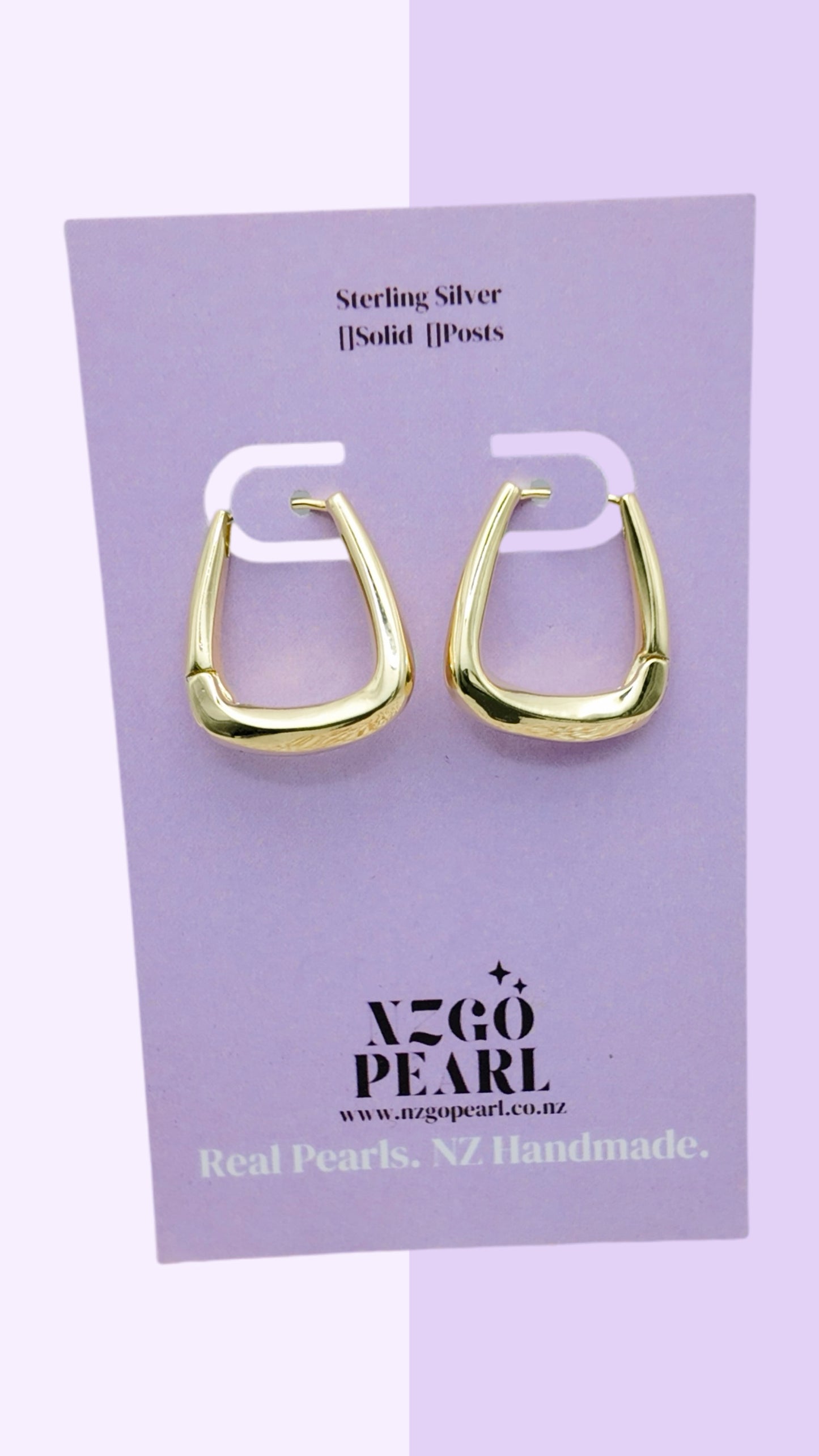 Modern Curve Huggie Earrings