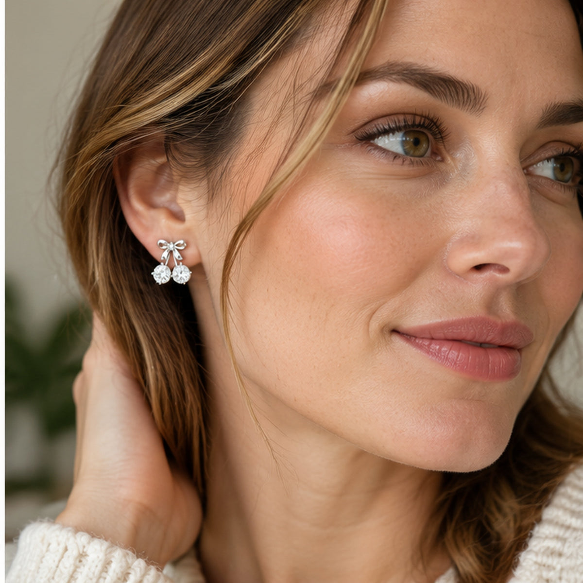 NZGO Pearl clear stone bow double drop stud earrings worn at realistic scale