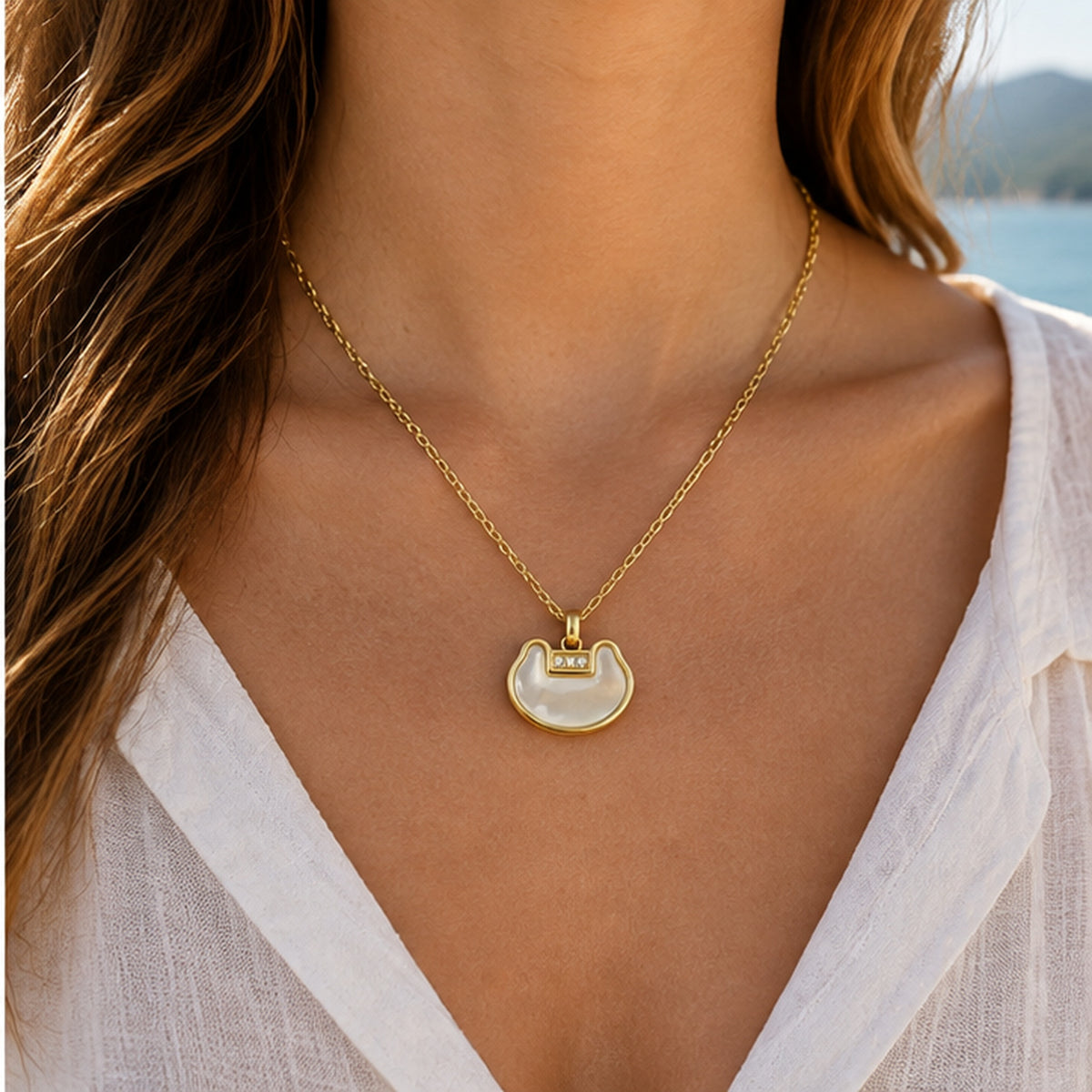 NZGO Pearl open crescent crystal pendant necklace worn at realistic scale
