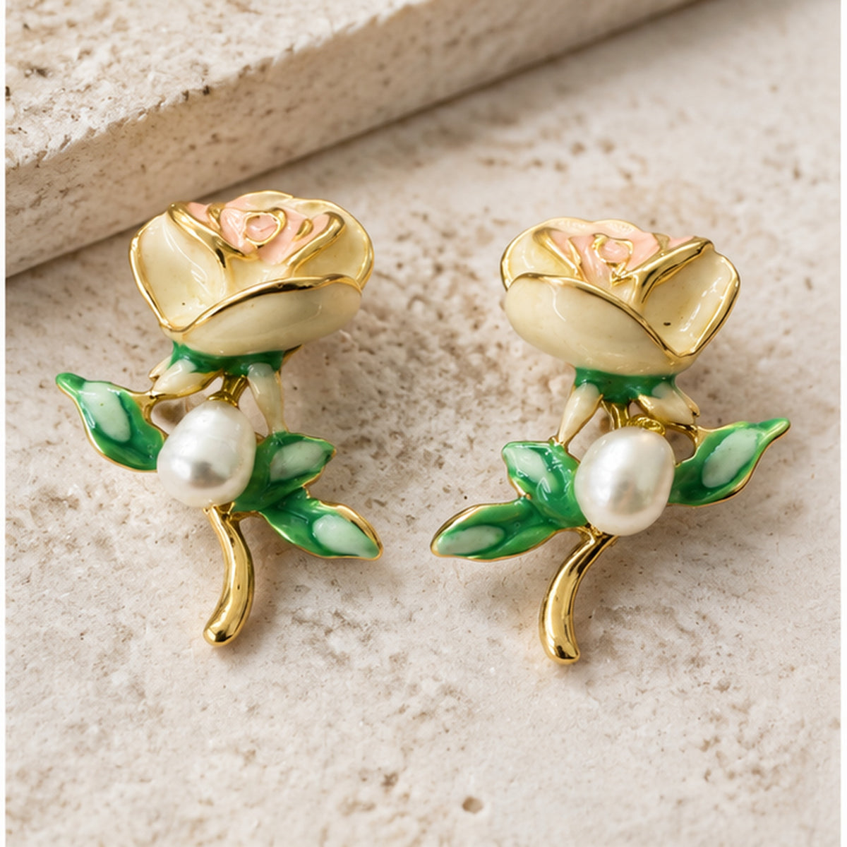 NZGO Pearl enamel rose real pearl earrings in a neutral studio setting