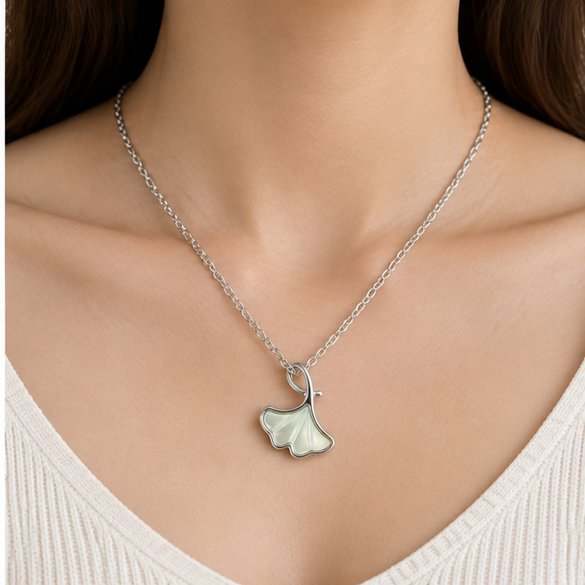 NZGO Pearl ginkgo leaf pendant necklace worn at realistic scale