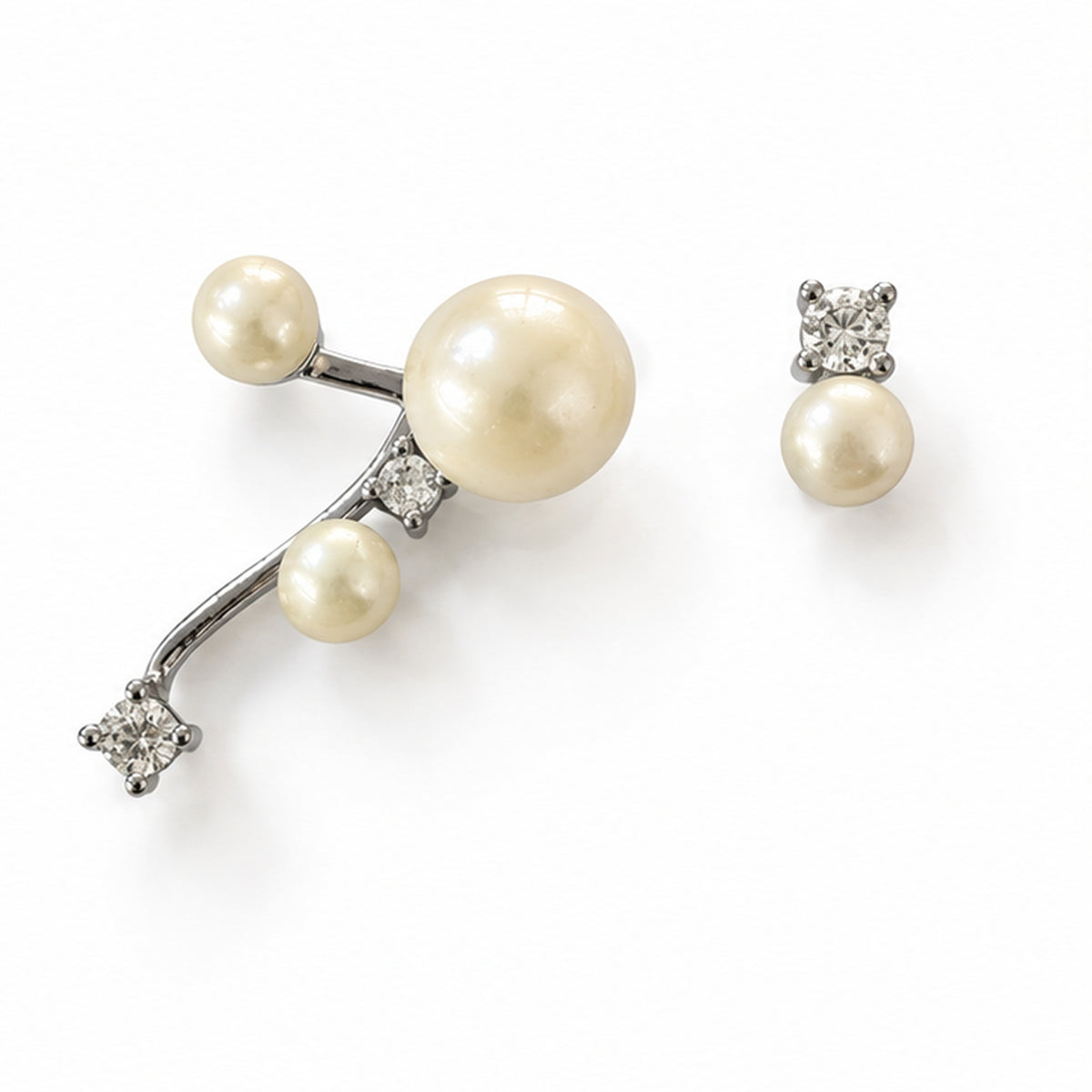 NZGO Pearl real pearl asymmetric silver earrings on a clean white background