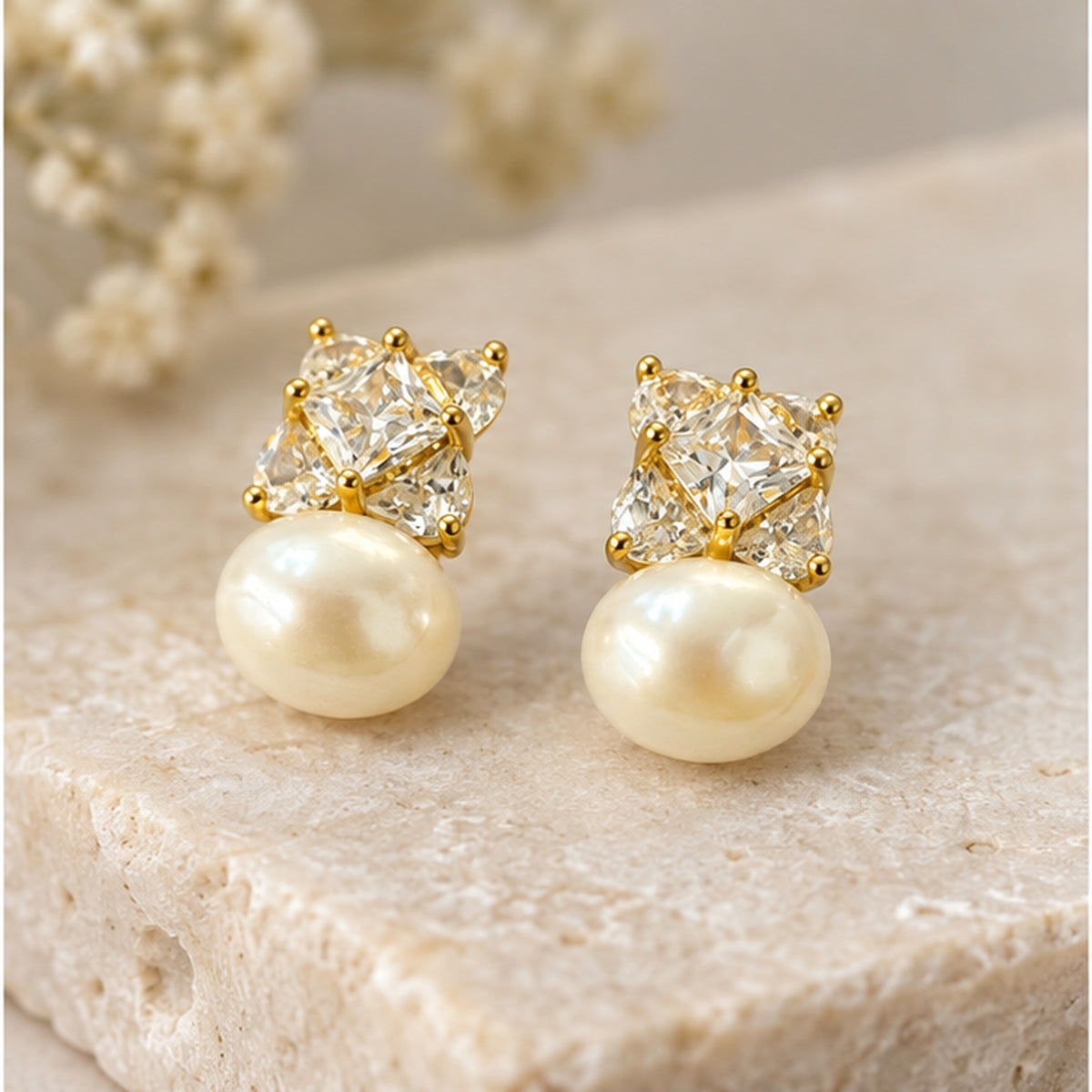 NZGO Pearl real pearl clear stone cluster stud earrings in a neutral studio setting