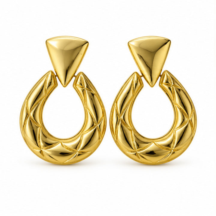 NZGO Pearl sculptural horseshoe statement earrings on a clean white background