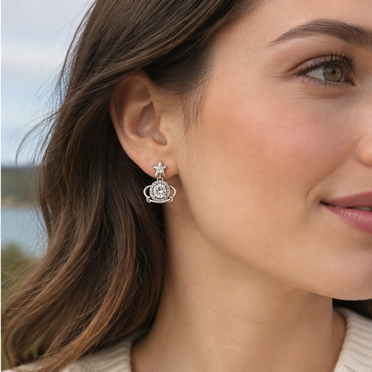 NZGO Pearl star orbit crystal drop earrings worn at realistic scale