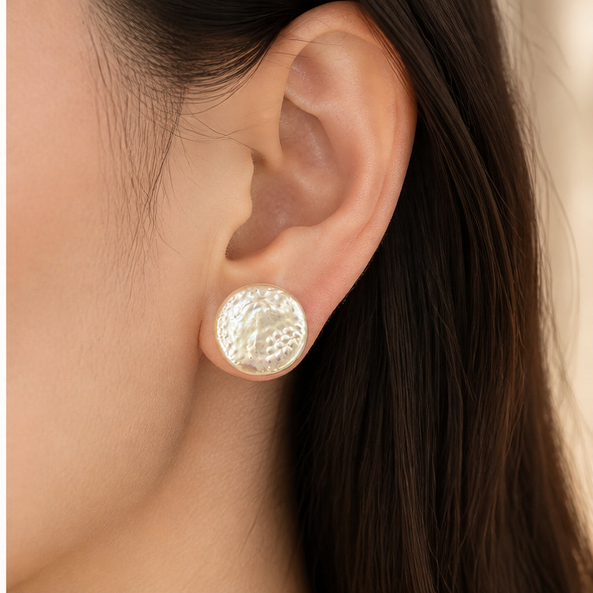Real dragon scale pearl stud earring with solid sterling silver post shown worn at realistic scale