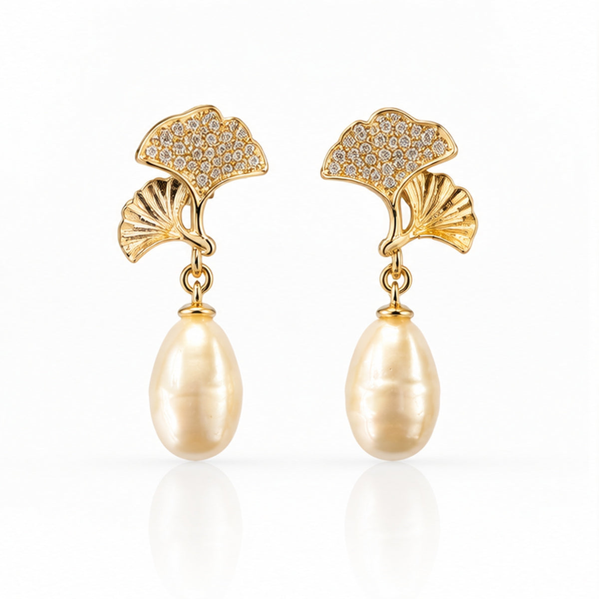 Ginkgo leaf real pearl drop earrings on a clean white background