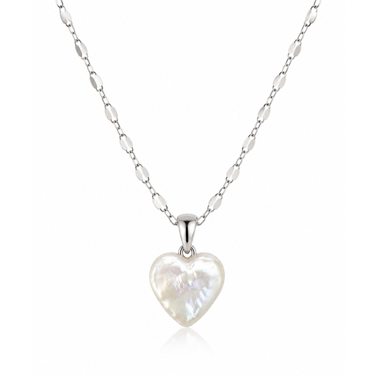 Petite sterling silver necklace with real pearl heart pendant on a clean white background