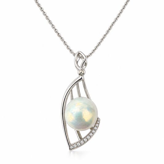 Silver-tone iridescent pearl and crystal pendant necklace on white background
